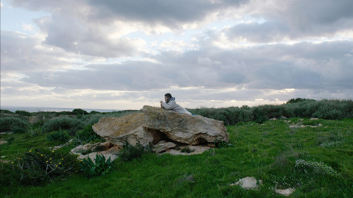 Samuele in the Lampedusan landscape in Fire At Sea, 2015