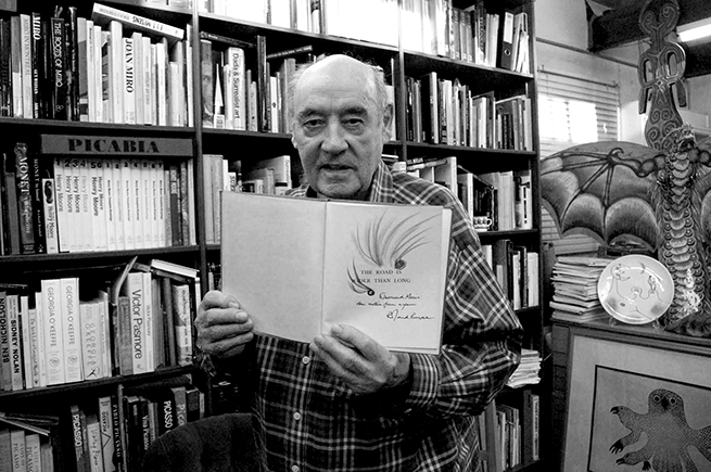 jpg Desmond Morris with Roland Penrose's book The Road is Wider Than Long. Image by Melanie Coles