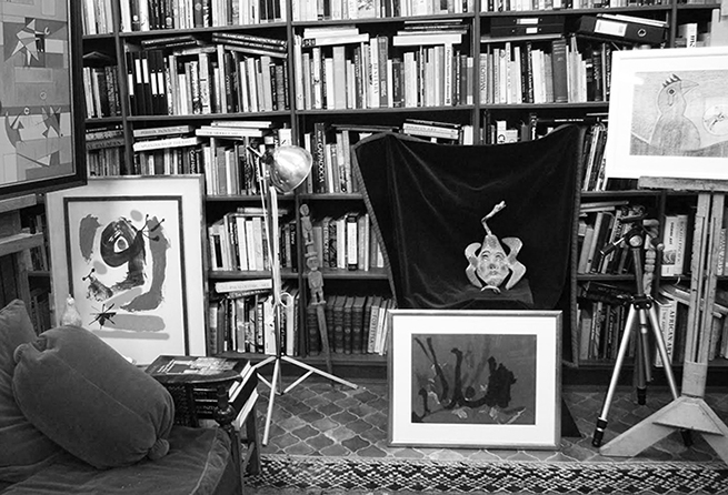 Desmond Morris's Oxford studio. Seen here is one of his earliest paintings (far left), a Joan Miro (left) and an original Congo painting (centre) amidst many other artifacts and books. Image by Melanie Coles.