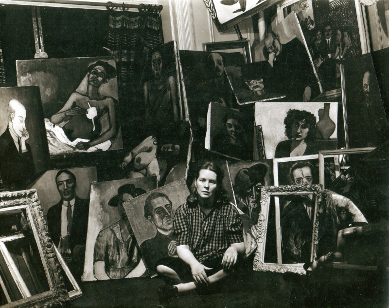 Alice Neel with lots of paintings