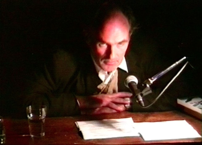 Chris Petit reads from Robinson at Subversion in the Street of Shame, 1994