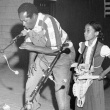Banjoist and bones player Abner Jay performs with child, ca. 1978